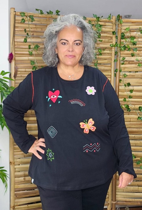 Camiseta Lo que Vibras Atraes